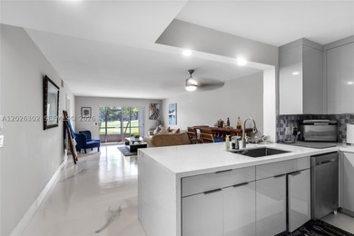 Beautiful! Completely remodeled 2 bed/2 bath first floor condo - photo 1