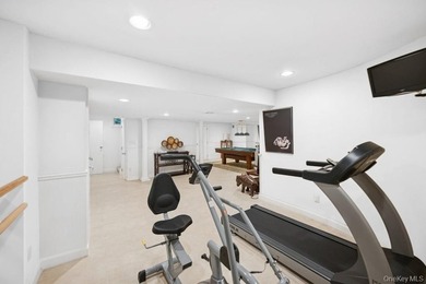 Tucked away on 1.4 acres of lush, landscaped grounds, this - photo 21