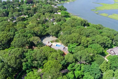 Tucked away on 1.4 acres of lush, landscaped grounds, this - photo 27