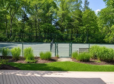 Tucked away on 1.4 acres of lush, landscaped grounds, this - photo 29