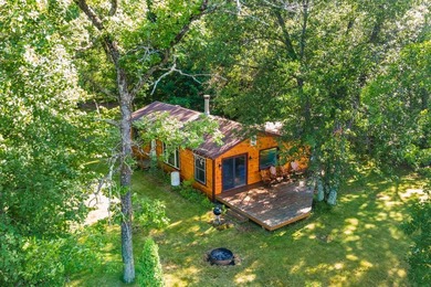 Turn Key Wisconsin River/Lake Petenwell waterfront cabin in a - photo 3