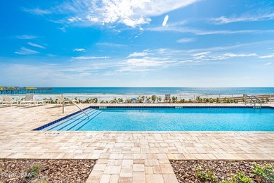 Experience coastal luxury at its finest in this rare first-floor - photo 6