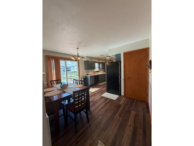 This home features a 2-car attached garage and a thoughtfully - photo 11