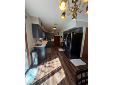 This home features a 2-car attached garage and a thoughtfully - photo 13