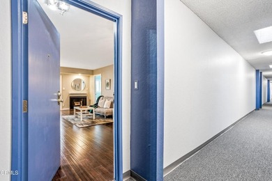 Welcome home to this 1-story top floor end unit that has been