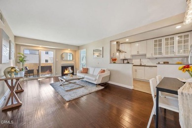 Welcome home to this 1-story top floor end unit that has been