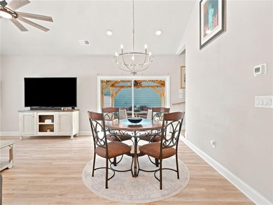 Sophistication meets the relaxed charm of lake living. This - photo 14