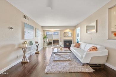 Welcome home to this 1-story top floor end unit that has been