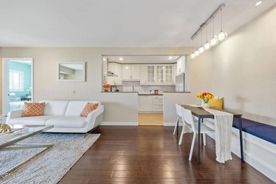 Welcome home to this 1-story top floor end unit that has been