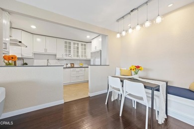 Welcome home to this 1-story top floor end unit that has been