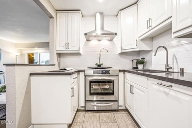 Welcome home to this 1-story top floor end unit that has been