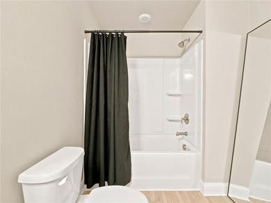 Sophistication meets the relaxed charm of lake living. This - photo 31