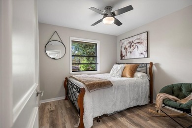 Welcome to a lake view haven where four bedrooms, three baths - photo 12