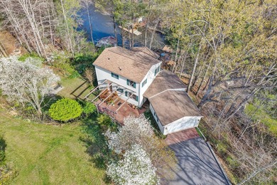 Welcome to your Smith Mountain Lake retreat! Tucked away in a - photo 1
