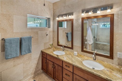 Fully remodeled in 2013, this elegant beachside home on Namala - photo 11