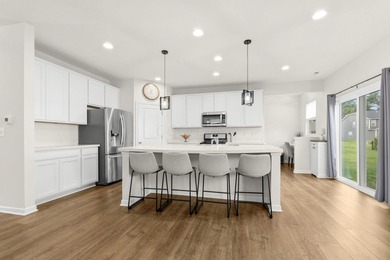 Welcome to this beautifully maintained, move-in-ready home that - photo 2