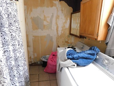 Investors take notice! This 3 bedroom 2 bathroom home nestled in - photo 12