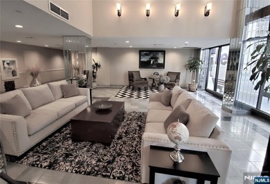 Beautifully Renovated Condo in the Prestigious World Plaza is