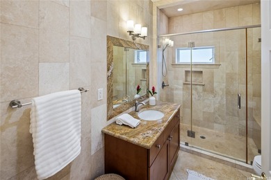 Fully remodeled in 2013, this elegant beachside home on Namala - photo 15