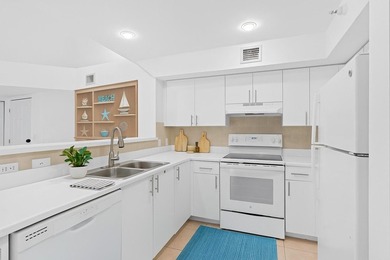 Welcome to this waterfront condominium situated in Yacht Club on - photo 16