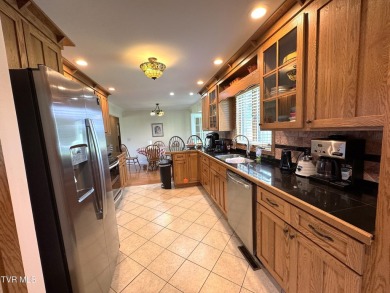 Nice, completely remodeled brick ranch with 3 master suites (one