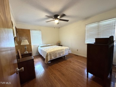 Nice, completely remodeled brick ranch with 3 master suites (one