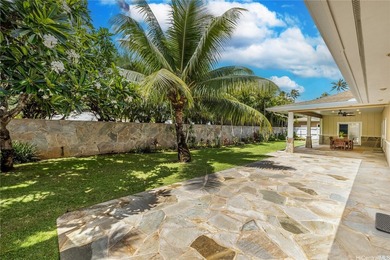 Fully remodeled in 2013, this elegant beachside home on Namala - photo 22