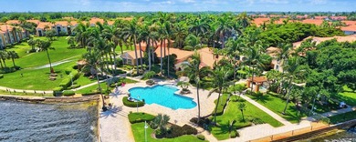 Welcome to this waterfront condominium situated in Yacht Club on - photo 25