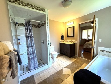 Nice, completely remodeled brick ranch with 3 master suites (one