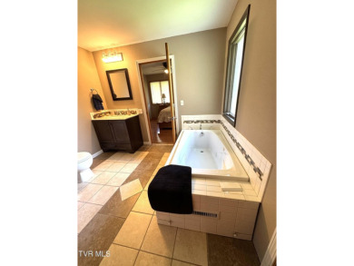 Nice, completely remodeled brick ranch with 3 master suites (one