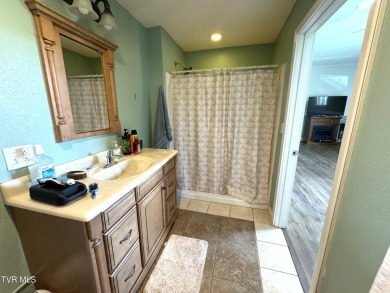 Nice, completely remodeled brick ranch with 3 master suites (one