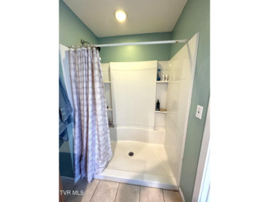 Nice, completely remodeled brick ranch with 3 master suites (one