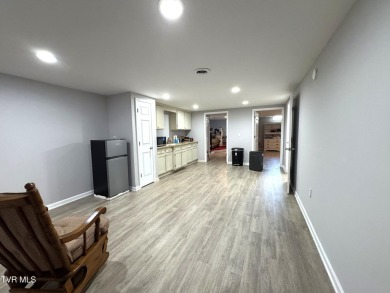 Nice, completely remodeled brick ranch with 3 master suites (one