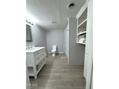 Nice, completely remodeled brick ranch with 3 master suites (one