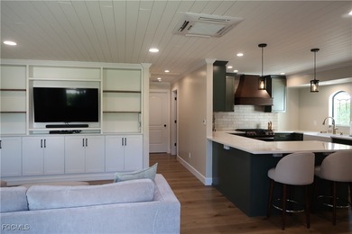 Step inside this recently renovated hidden gem, located directly - photo 2
