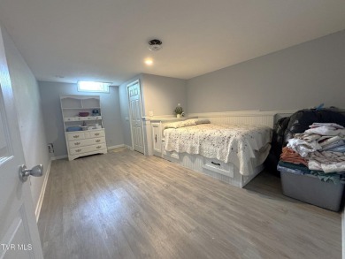 Nice, completely remodeled brick ranch with 3 master suites (one