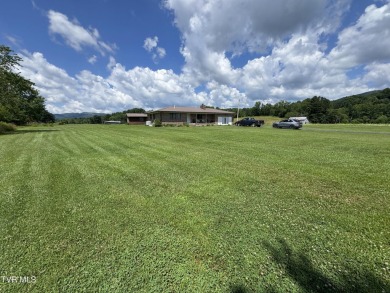 Nice, completely remodeled brick ranch with 3 master suites (one