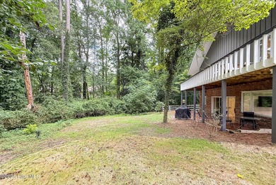 Welcome to 7 Inverness Place, a fully remodeled golf-front home - photo 5