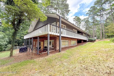 Welcome to 7 Inverness Place, a fully remodeled golf-front home - photo 7