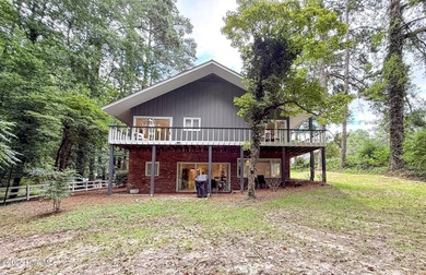 Welcome to 7 Inverness Place, a fully remodeled golf-front home - photo 8