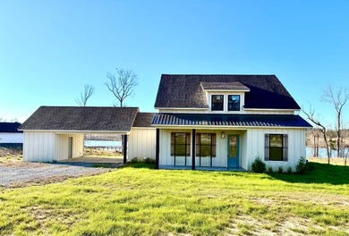 Indulge in the essence of refined lakefront living with the - photo 2