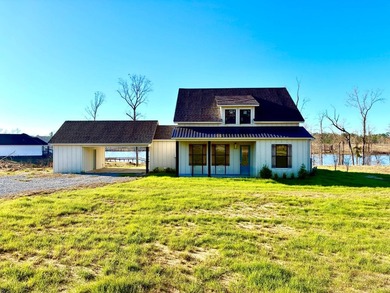 Indulge in the essence of refined lakefront living with the - photo 3