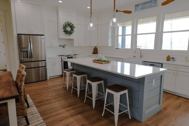 Indulge in the essence of refined lakefront living with the - photo 9