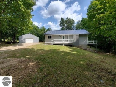 Lake Home For Sale in West Branch, Michigan