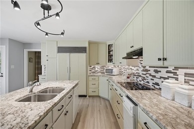 Set on a 1.65 spectacular waterfront lot, this exceptional - photo 15