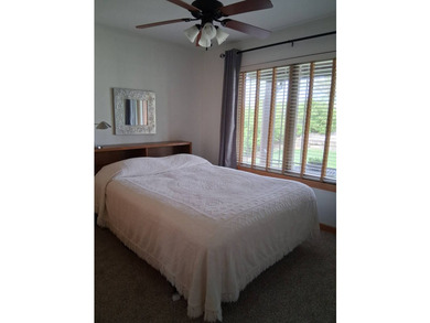 Nestled into a quiet cove, this 1 1/2 story home offers 3 - photo 20