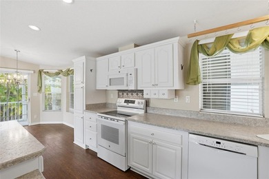 Discover easy Florida living in this beautifully maintained - photo 5