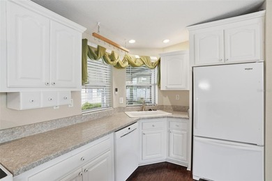 Discover easy Florida living in this beautifully maintained - photo 6