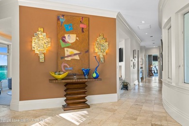 This 5BR Trillium estate redefines lake living. Over 850 ft of - photo 9