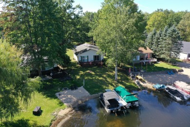 Lake James Home For Sale in Prudenville Michigan